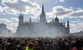 Marijuana smoke lingers in front of Parliament Hill during a 4/20 rally in Ottawa, Ontario, Canada.